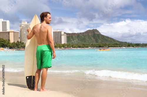 Photography Hawaii surf man surfer surfing on Waikiki beach