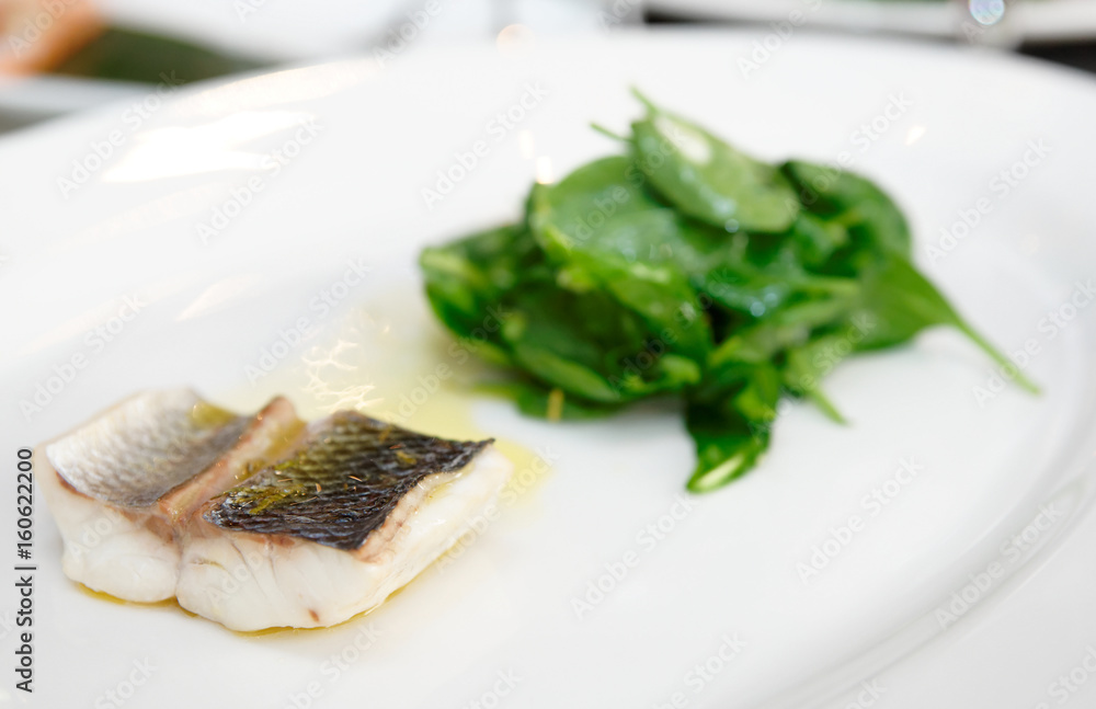 Simple but tasty piece of steamed seabass fillet Simple but tasty piece of steamed seabass fillet