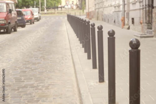 Columns That Restrict The Movement Of Vehicles And Parking, Bars For Limiting, Blurred Focus