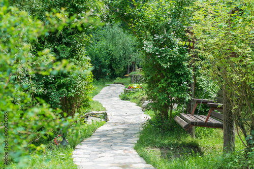 Garden swing wooden bench with path