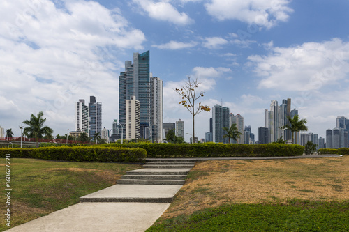 View of a park in the downtown of Panama City with modern buildings on the background, in Panama.