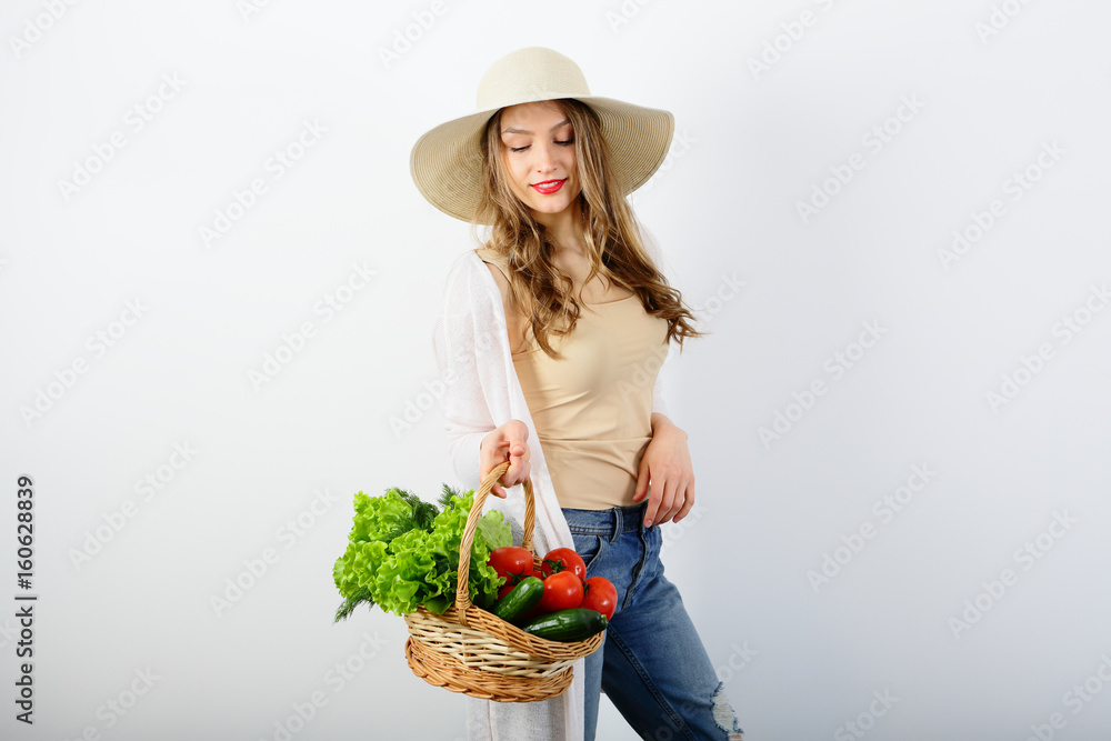 Beautiful young woman with organic healthy food, basket vegetables, fresh, lifestyle