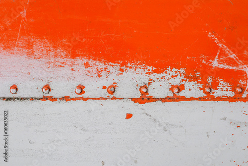 iron surface is covered with remnants of old paint, texture background