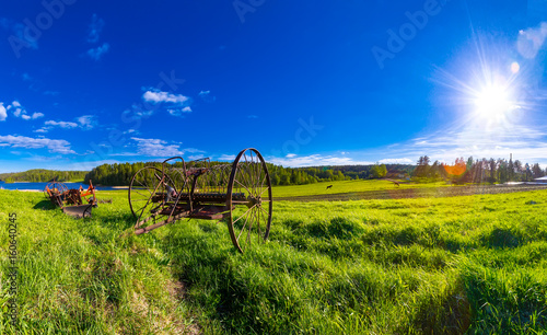 Old farm equipment on field...