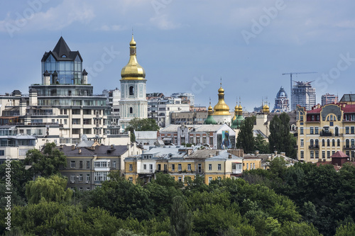 Capital of Ukraine, Kiev. Old and modern architecture of Kiev, Ukraine. City landscape of capital city with gold church