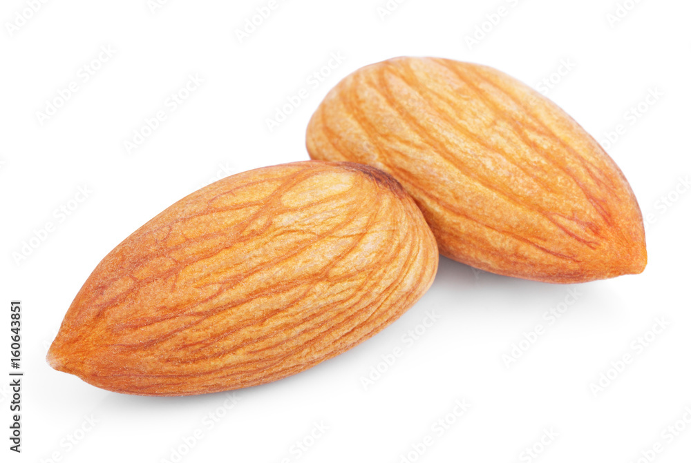 Closeup of two almond nuts isolated on white background Closeup of two almond nuts isolated on white background