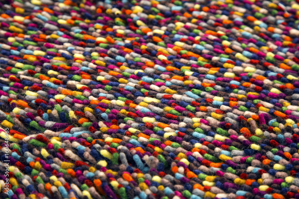 Multicolored fabric close up view. Close up textile texture. Colorful background wool. Abstract pattern of fibers. 