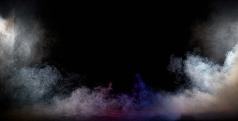 Dark interior full of dense, white fume