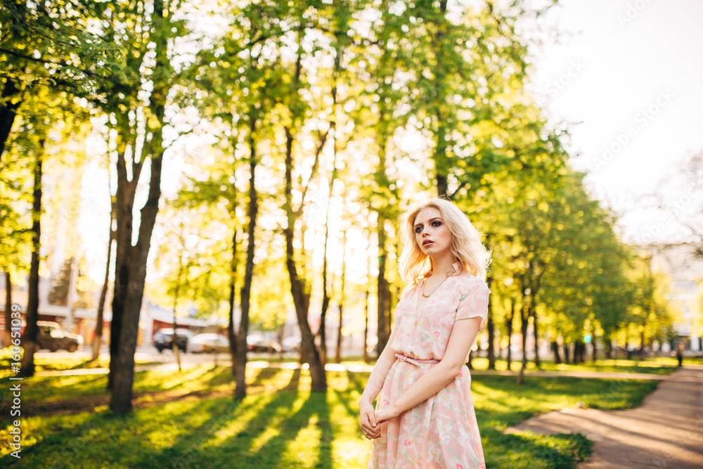 Portrait of young beautiful happy girl on background of the summer forest Portrait of young beautiful happy girl on background of the summer forest