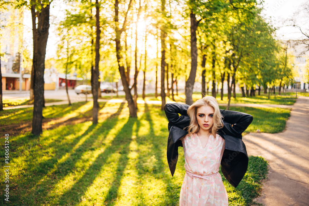 Portrait of young beautiful happy girl on background of the summer forest Portrait of young beautiful happy girl on background of the summer forest