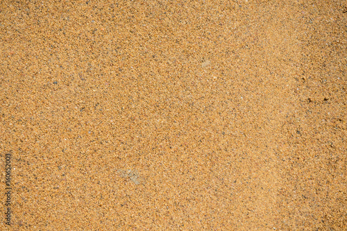 Background Industrial sand for construction works. Natural material for bricks and concrete products - loose rock, which grains of feldspar, mica, quartz and other minerals.