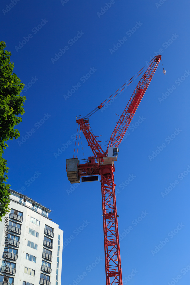 Construction crane, and Cranbrook House Serviced apartments in Nottingham.