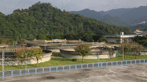 Taipei, Taiwan-05 December, 2015: A solid contact sedimentation tanks in a water purification plant located in Taipei, northern Taiwan. Sludge pool. Circular clarifier. photo