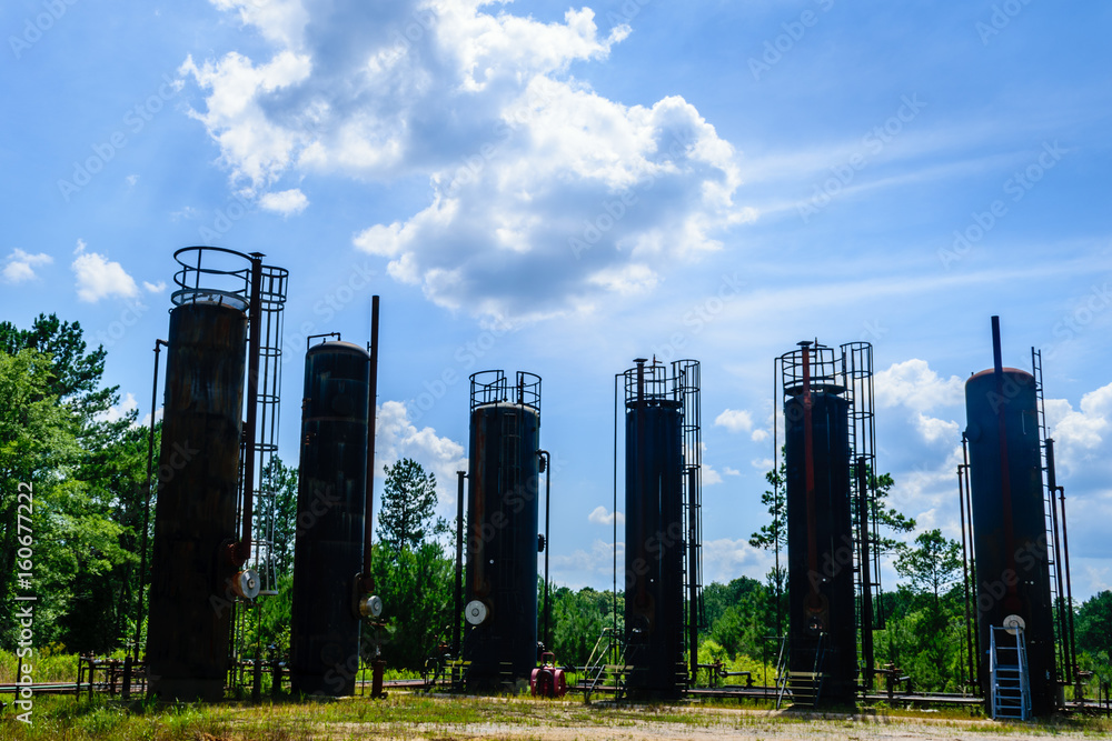 Oil Cylinders in the landscape