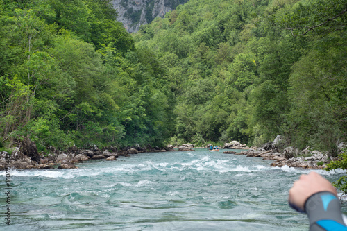 Extreme sports activity - rafting, camping, on river photo