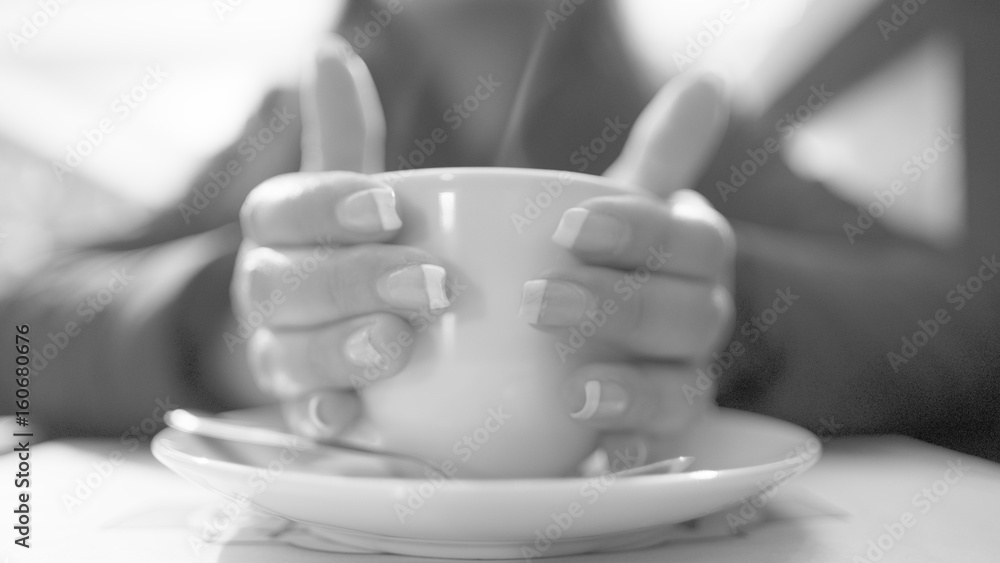 Warming hands on coffee Warming hands on coffee