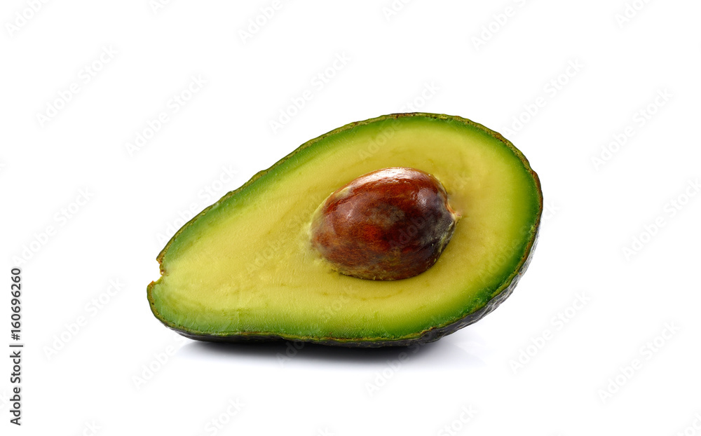 Half of avocado fruit isolated on white