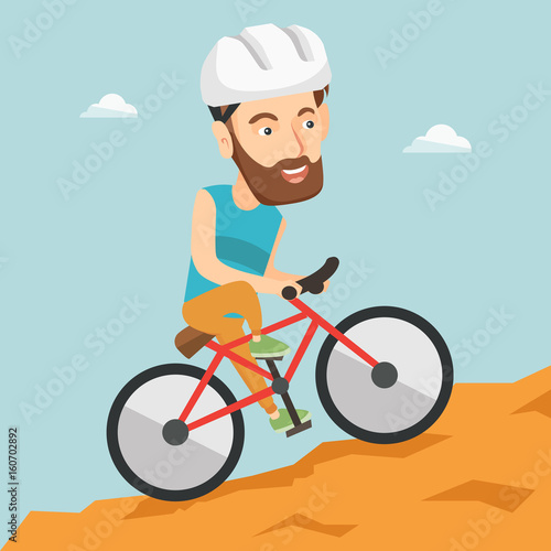 Young man on bicycle traveling in the mountains.