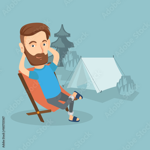 Man sitting in folding chair in the camp.