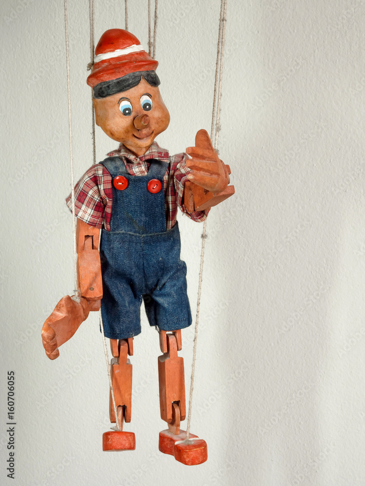 Obraz na plátně Traditional puppets made of wood.