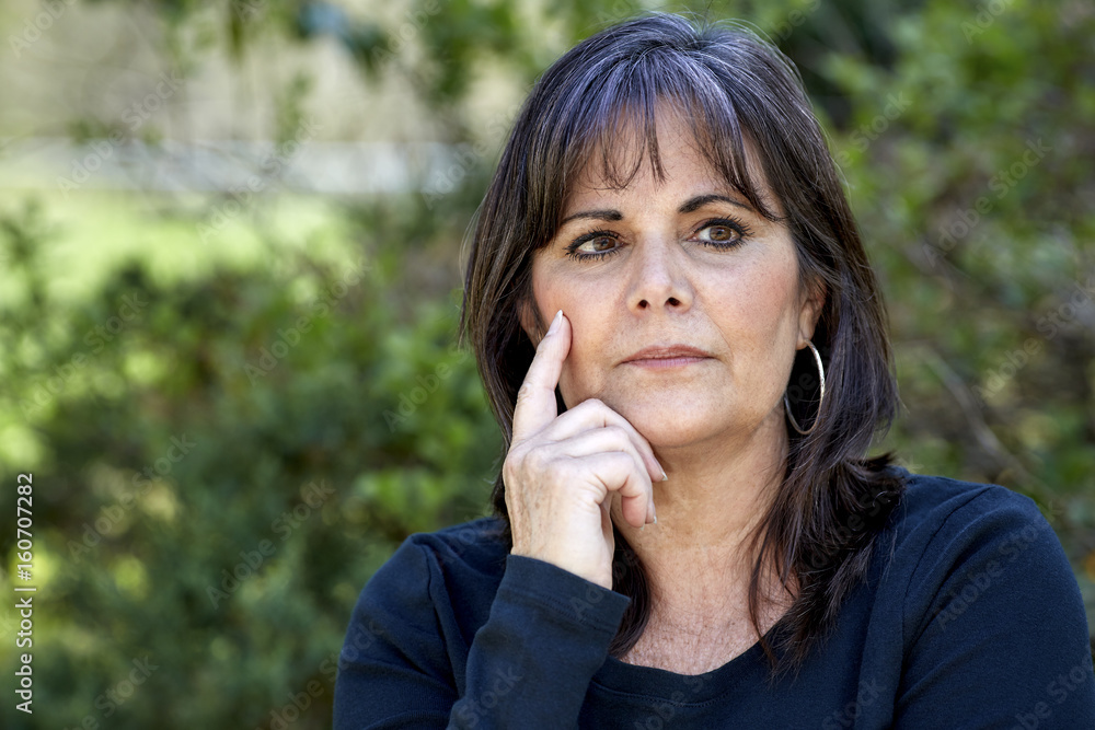 Middle Aged Woman Contemplating Middle Aged Woman Contemplating