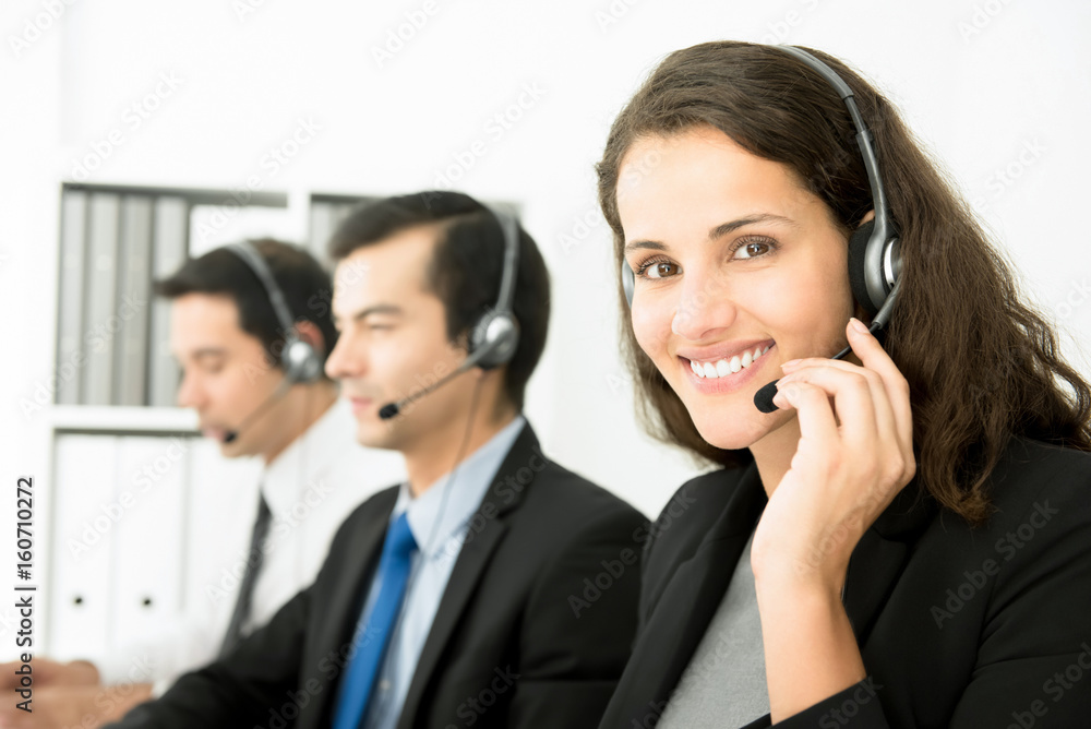 Businesswoman working in call center Businesswoman working in call center