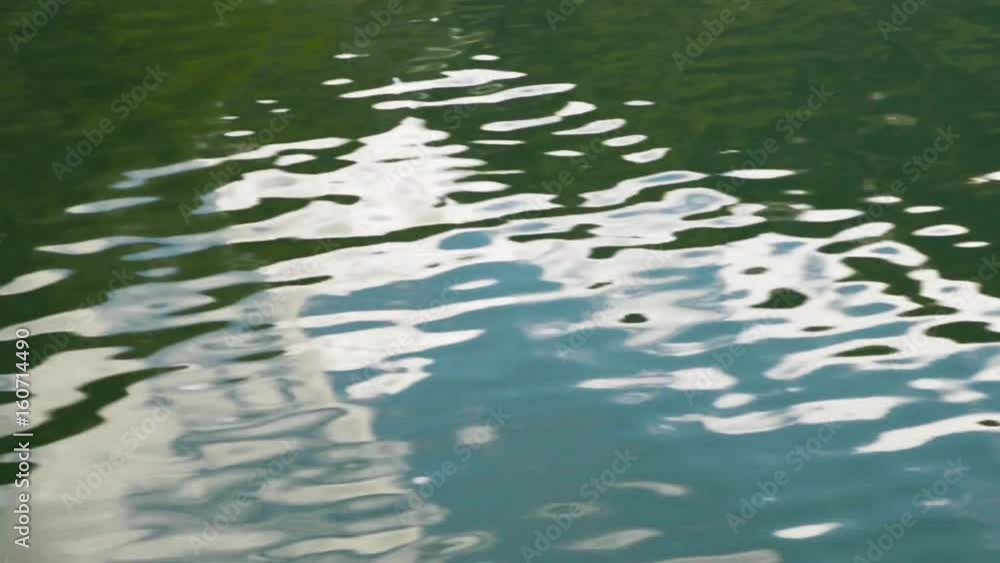 The trail of the boat on the water The trail of the boat on the water