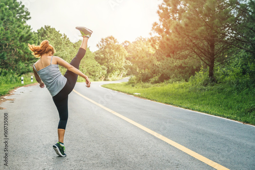 Women exercise on the street. Nature park. Asian women