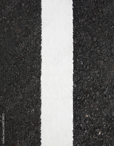 Asphalt road texture with white stripe. © zilvergolf
