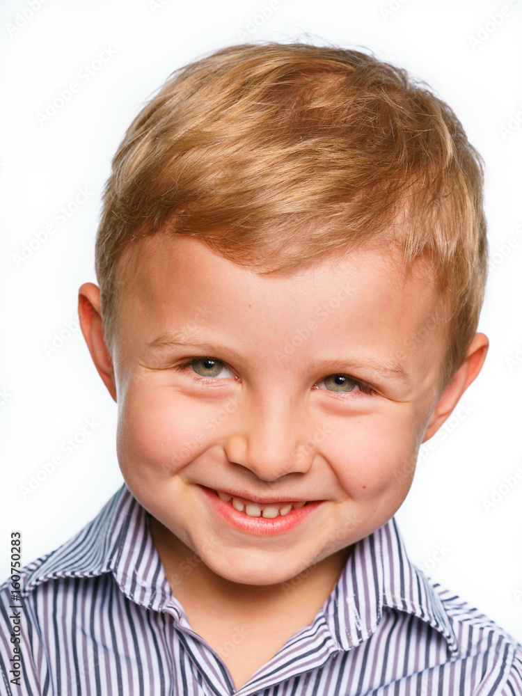 His first experience to make photo for passport or ID card. Emotionally grimacing little boy with blond hair and bright green eyes. White background. His first experience to make photo for passport or ID card. Emotionally grimacing little boy with blond hair and bright green eyes. White background.
