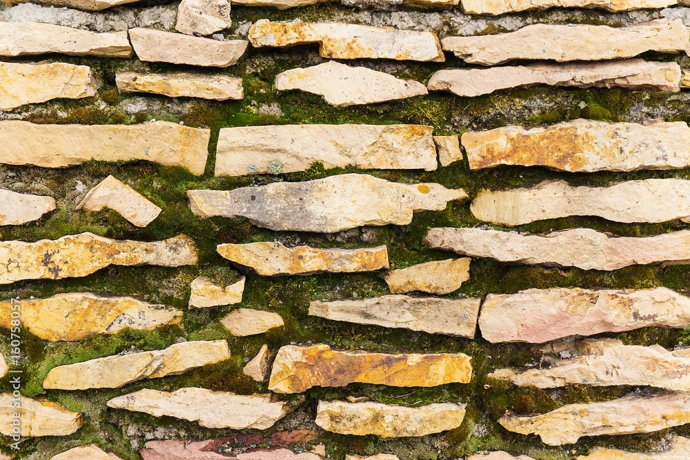 Background and texture of an old stone wall.