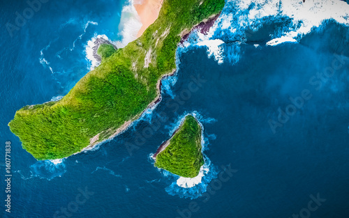Amazing Green Field Island. Aerial Green Background View. Nature Green and Blue Tropical Landscape. Top Aerial Landscape. Beautiful Clean Sky, Top View. Sea Surface with Paradise Beach Background