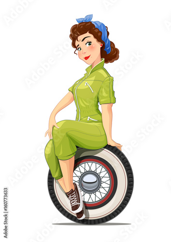 Girl automechanic with vintage car wheel. Tyre repair service.