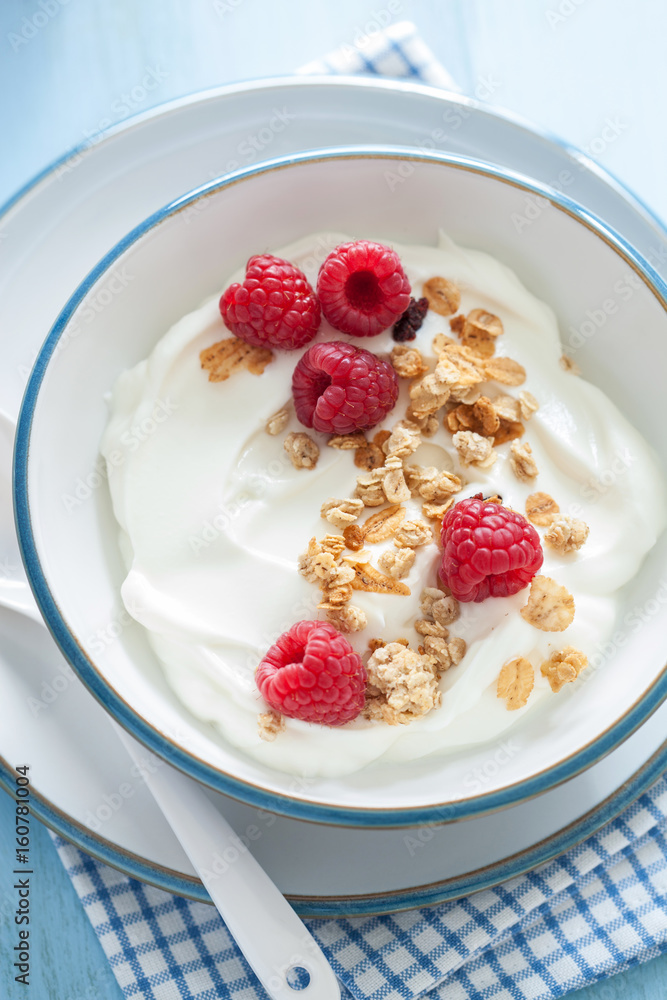 yogurt with granola and raspberry for healthy breakfast yogurt with granola and raspberry for healthy breakfast