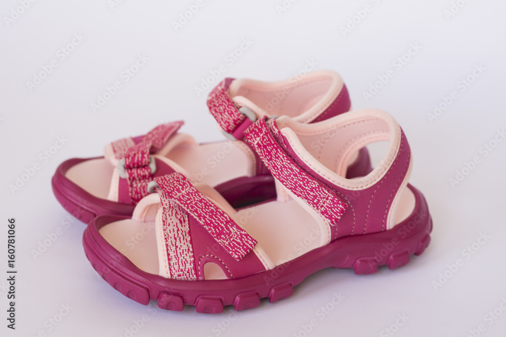 Obraz premium Pink sandals isolated on white background