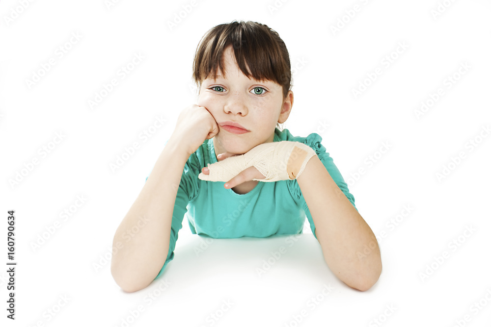 Child with broken arm. Isolated on white background