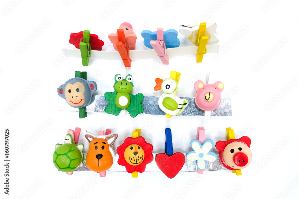 Fototapeta premium Animal and flower clothespins, isolated on a white background