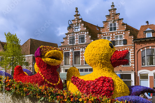 Statue made of tulips on flowers parade in Haarlem Netherlands photo