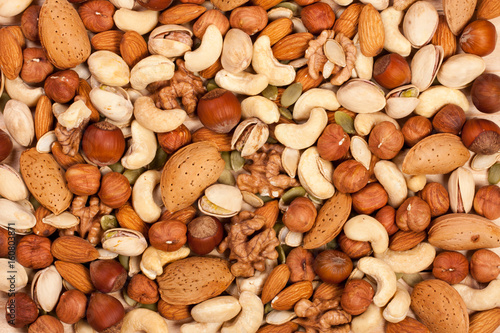 Mix of different nuts as background close-up