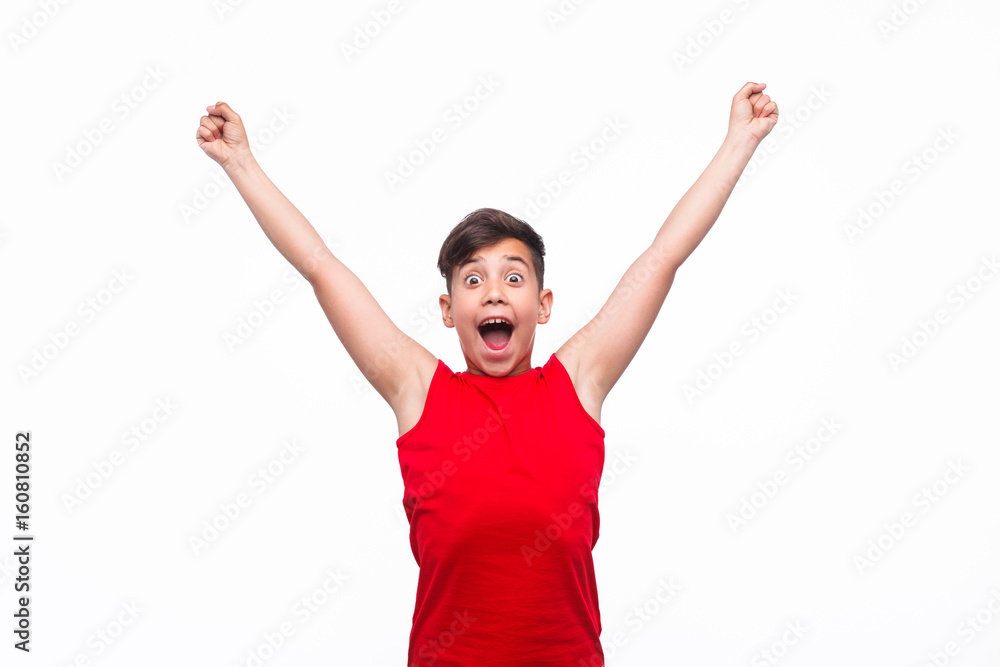 Excited boy posing as winner Excited boy posing as winner