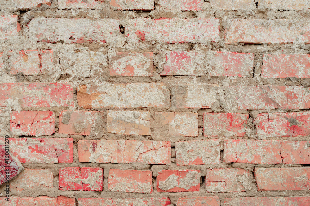 Naklejka premium Brick texture with scratches and cracks