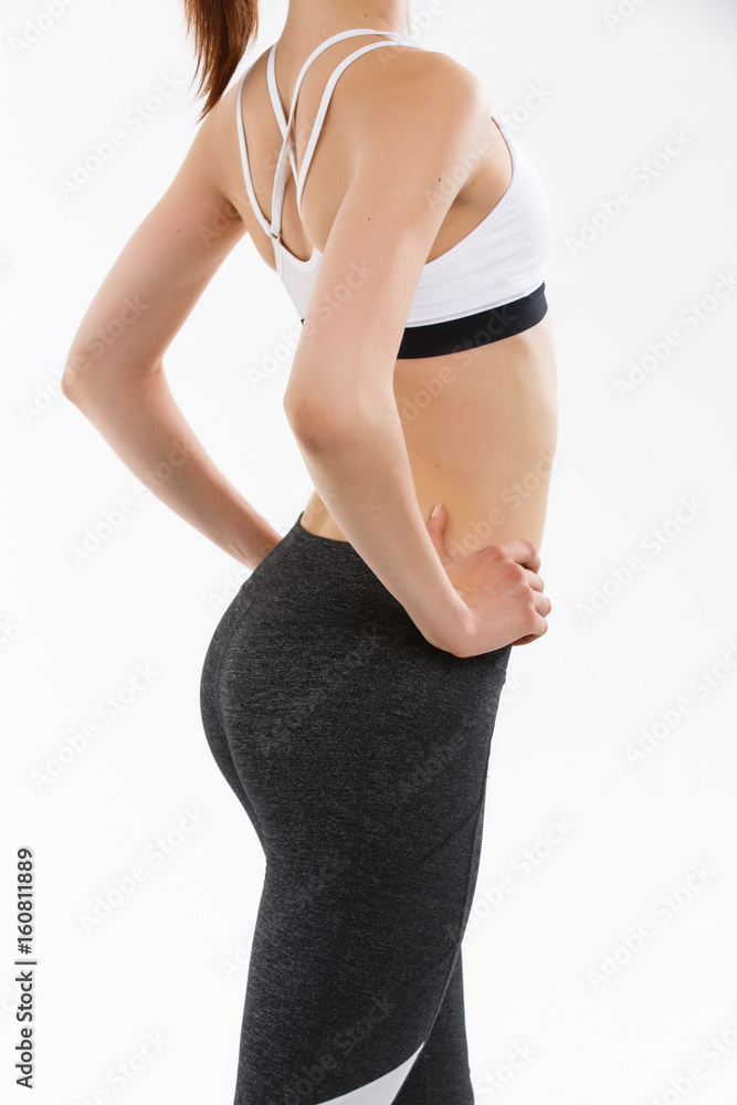 Fototapeta premium Sport body of a young girl