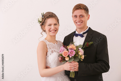 Young beautiful newlyweds h...