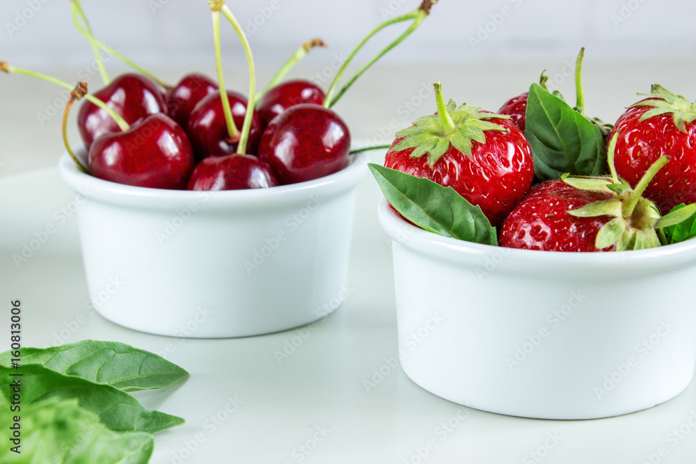 Ripe strawberries, mint and black cherry Ripe strawberries, mint and black cherry