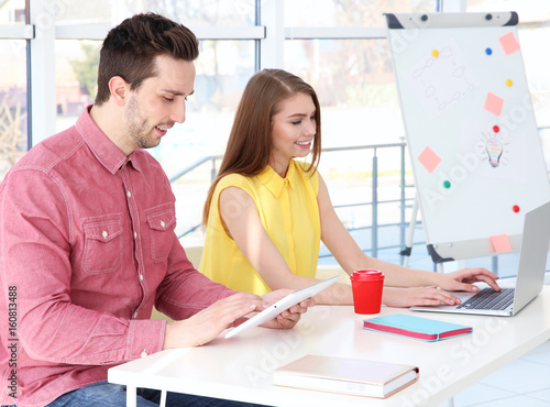 Young people working in office