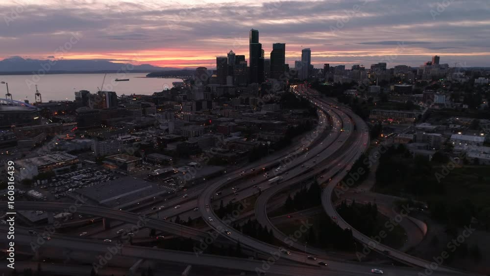 Cityscape Aerial of Urban Landscape at Night with Colorful Sunset Afterglow on Skyline Buildings Cityscape Aerial of Urban Landscape at Night with Colorful Sunset Afterglow on Skyline Buildings
