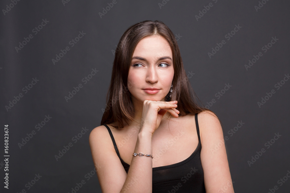 Portrait of thoughtful woman with mysterious look Portrait of thoughtful woman with mysterious look