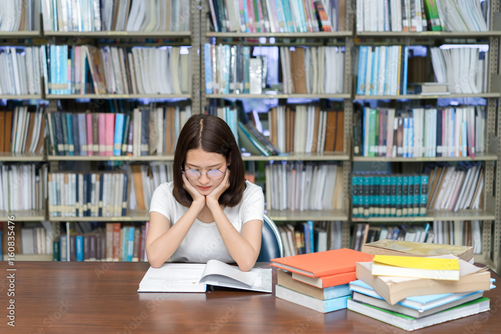Young Girl Student with Glasses Reading book Overlap Serious, Hard Exam, Quiz, Test Sleeping headache worry in Classroom Education Library University Knowledge center Young Girl Student with Glasses Reading book Overlap Serious, Hard Exam, Quiz, Test Sleeping headache worry in Classroom Education Library University Knowledge center