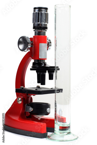 Microscope for biology and flasks on white background