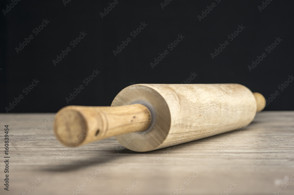 Close up shot of a rolling pin on table
